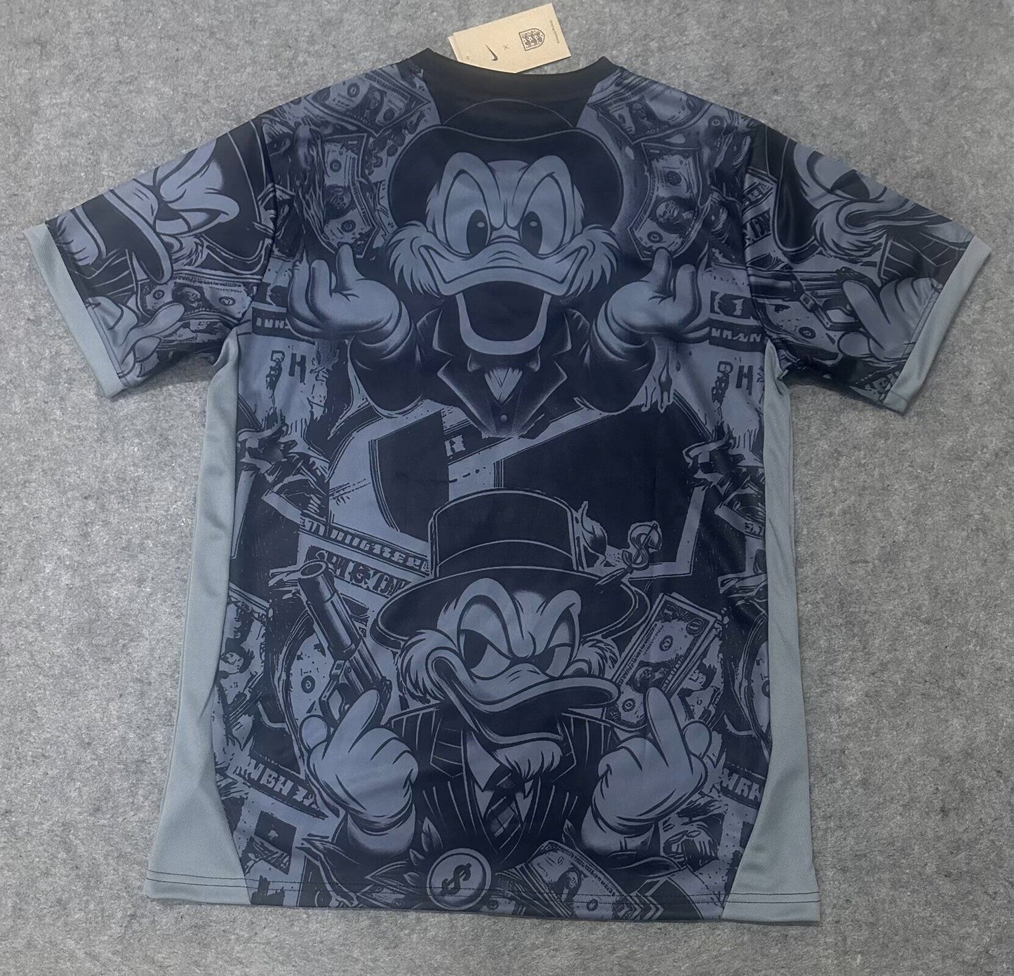 Camiseta Inglaterra 2026 versión Pato Donald (tallas S-4XL)