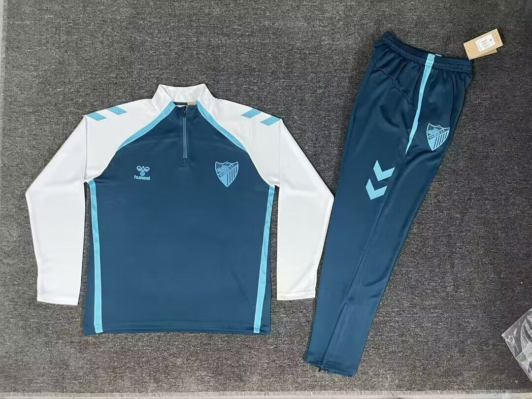 Chandal de entrenamiento Malaga 25/26 azul con blanco (tallas S-XXL)