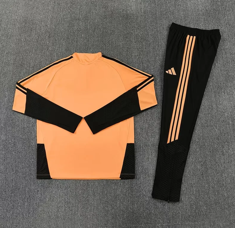 Chandal de entrenamiento Arsenal 26/27 naranja con negro (tallas adultos y niños)