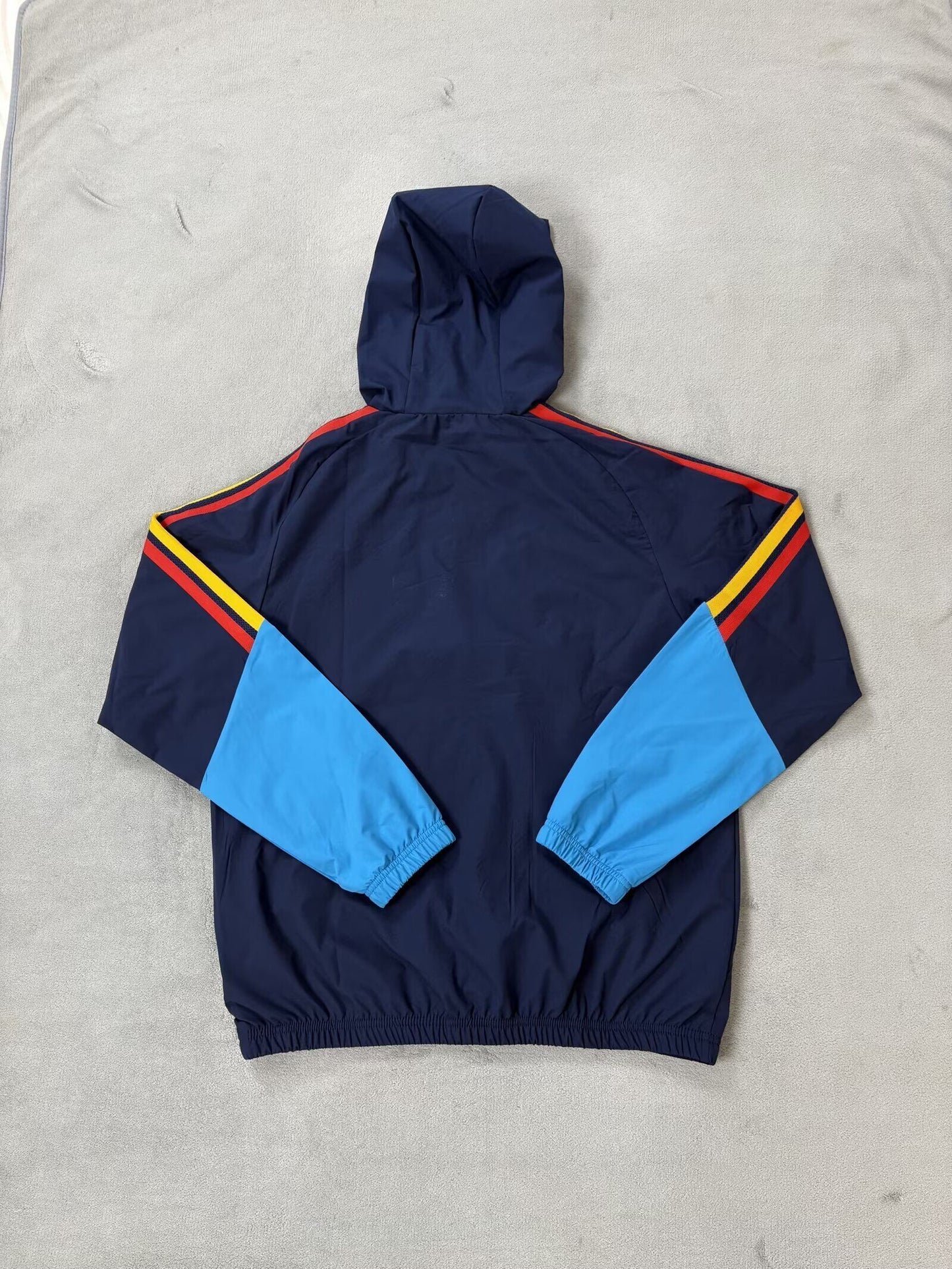 Chaqueta cortavientos con gorro España 2026 (Solo tallas S-XXL)
