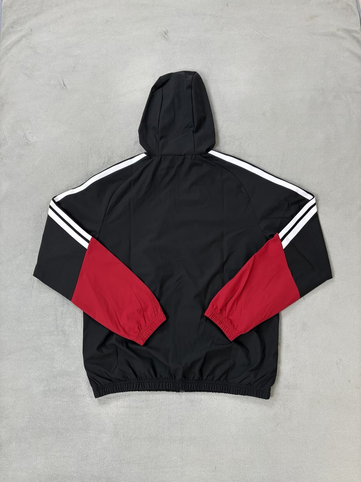 Chaqueta cortavientos con gorro Alemania 25/26 (Solo tallas S-2XL)