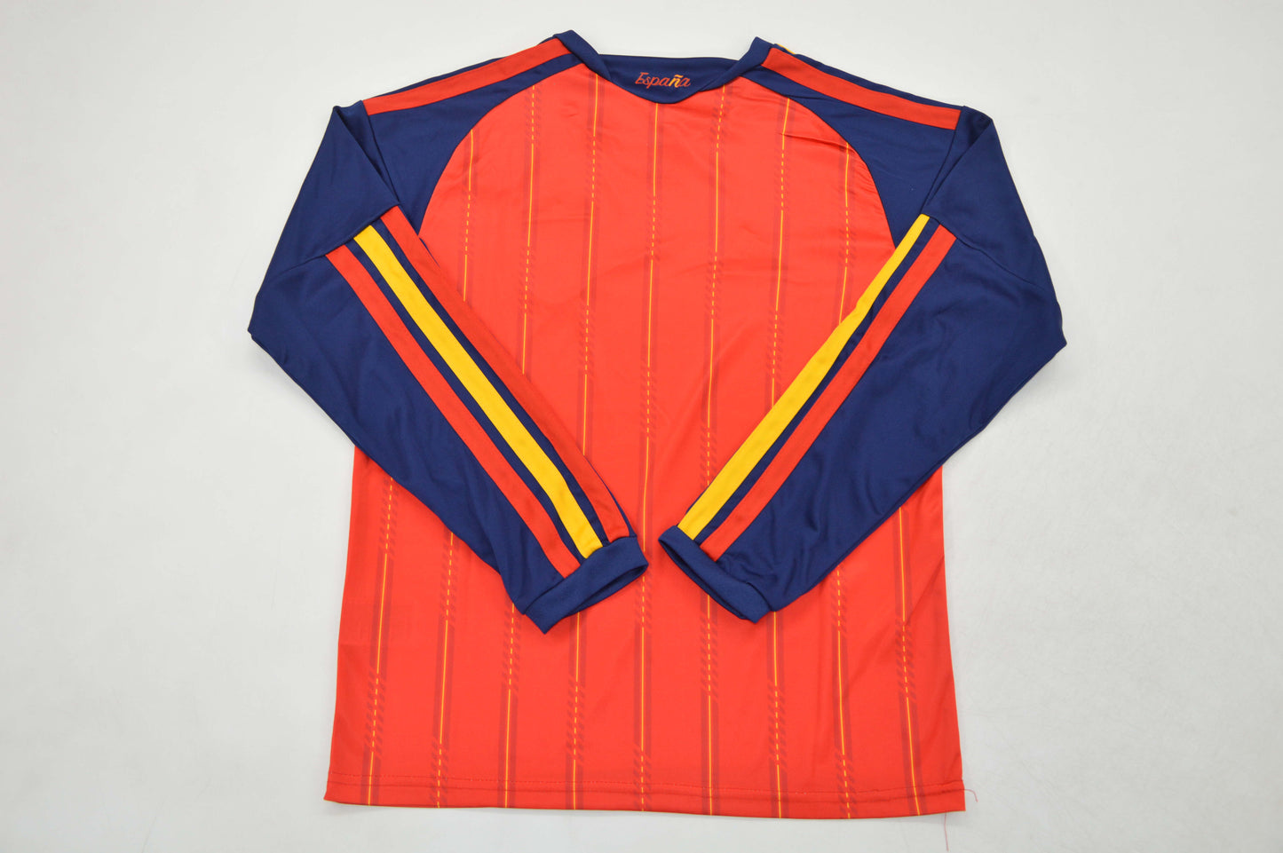 Equipacion de manga larga España Mundial 2026 local (solo talla niño)