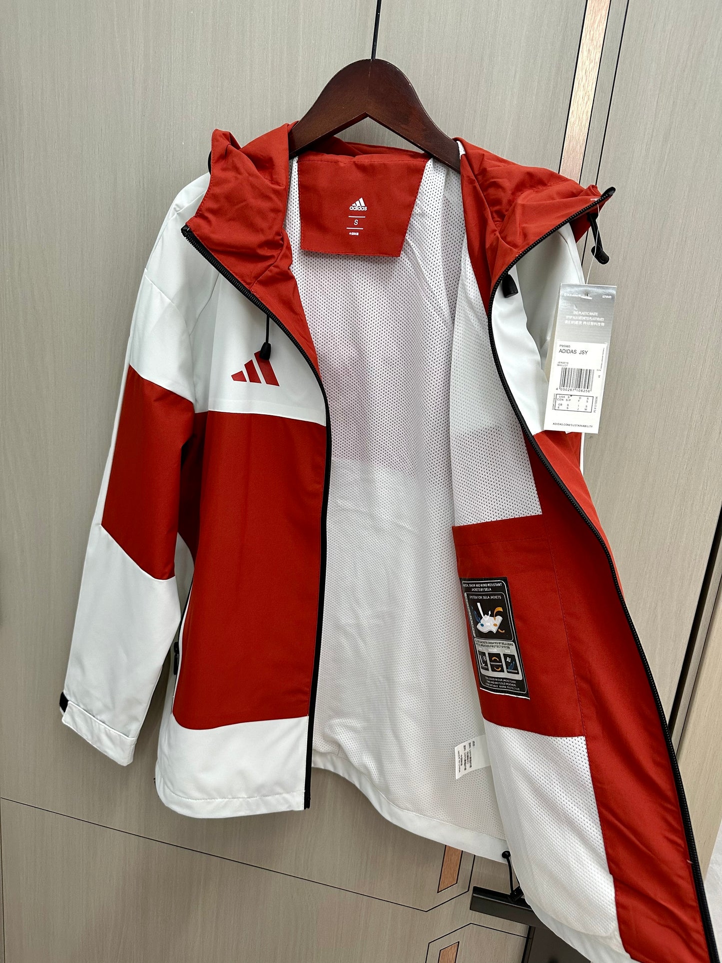 Cortavientos Sevilla blanco y rojo (solo tallas S-2XL)