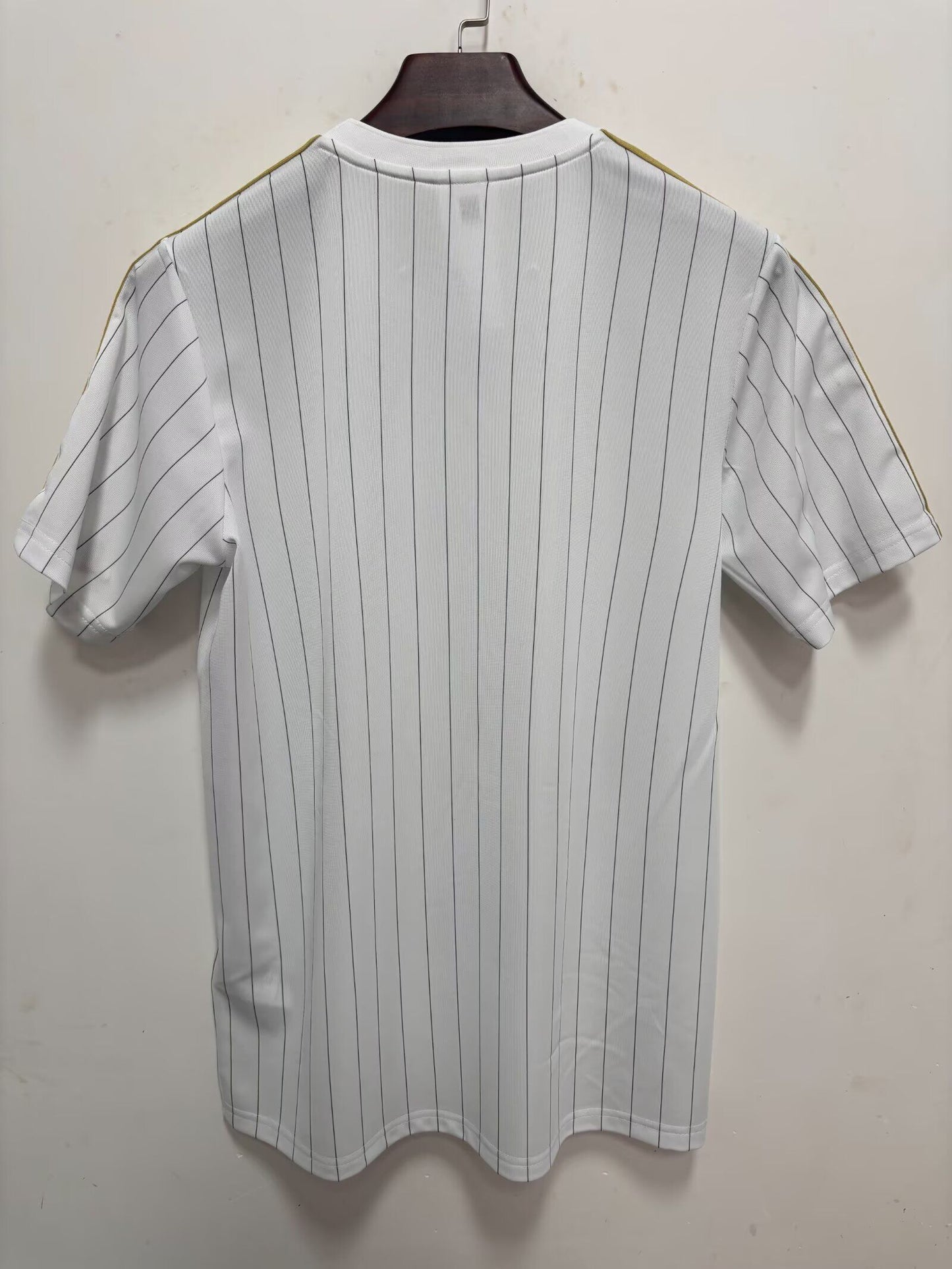 Camiseta Real Madrid ICON dorada
