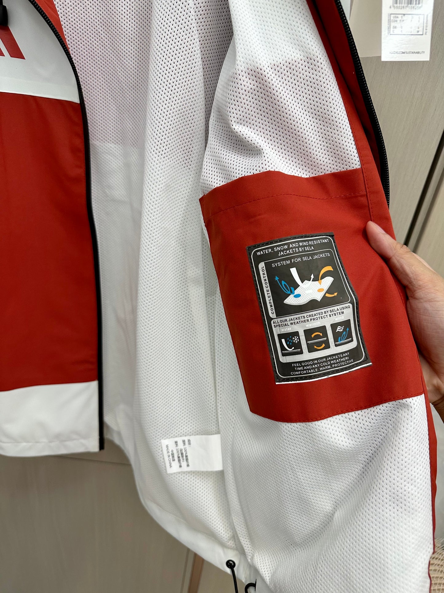 Cortavientos Sevilla blanco y rojo (solo tallas S-2XL)
