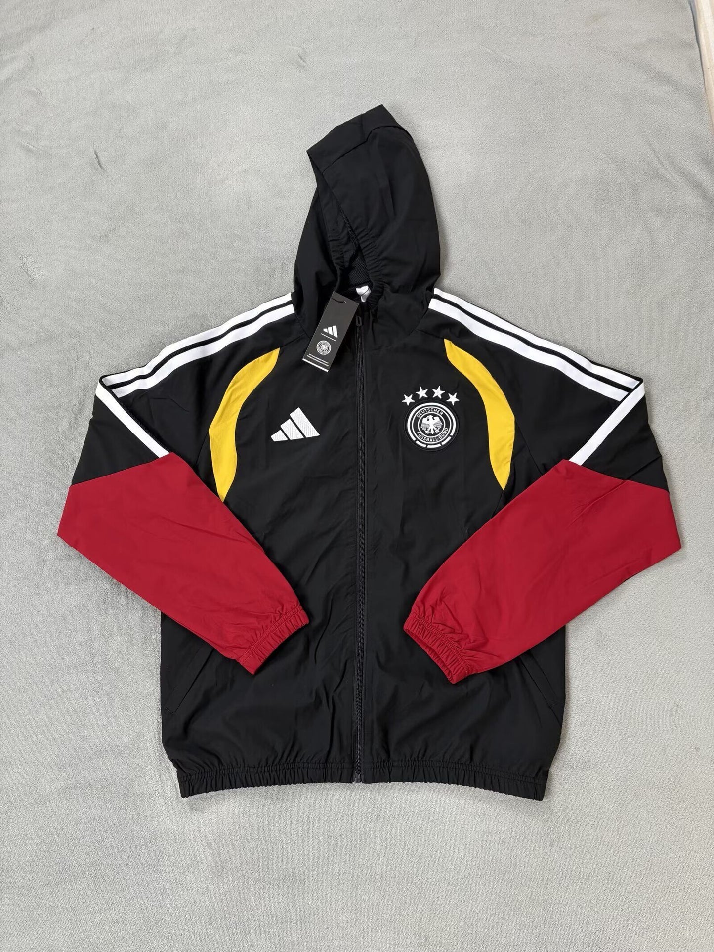 Chaqueta cortavientos con gorro Alemania 25/26 (Solo tallas S-2XL)