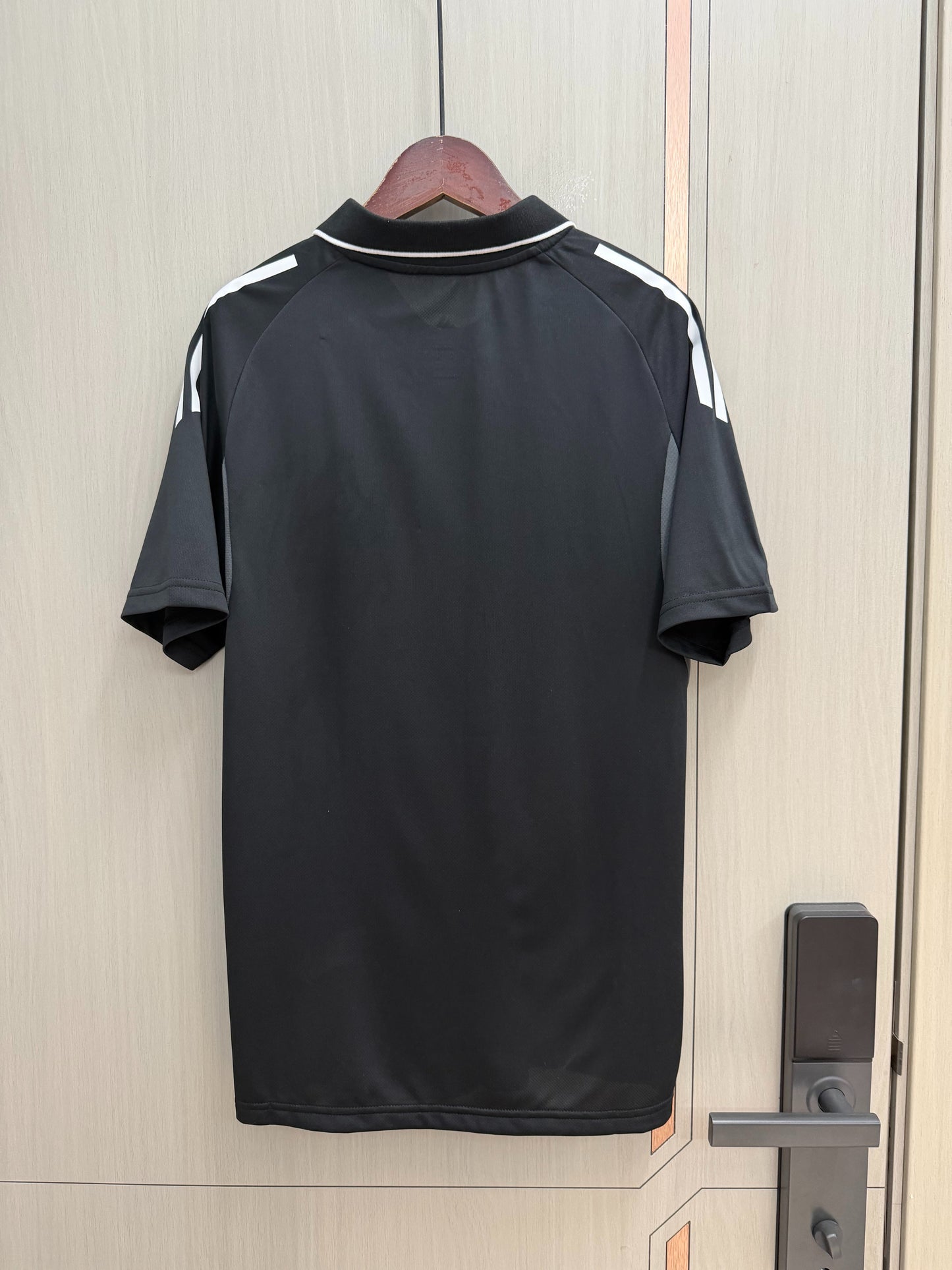 Polo Sevilla 25/26 Negro (tallas S-2XL)