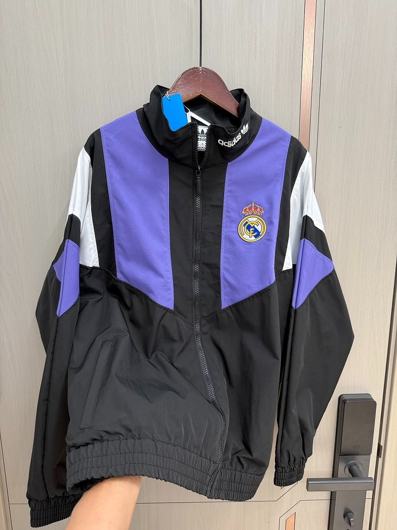 Chaqueta cortavientos Reak Madrid 26-27 negra con morado y blanco (tallas S-3XL)