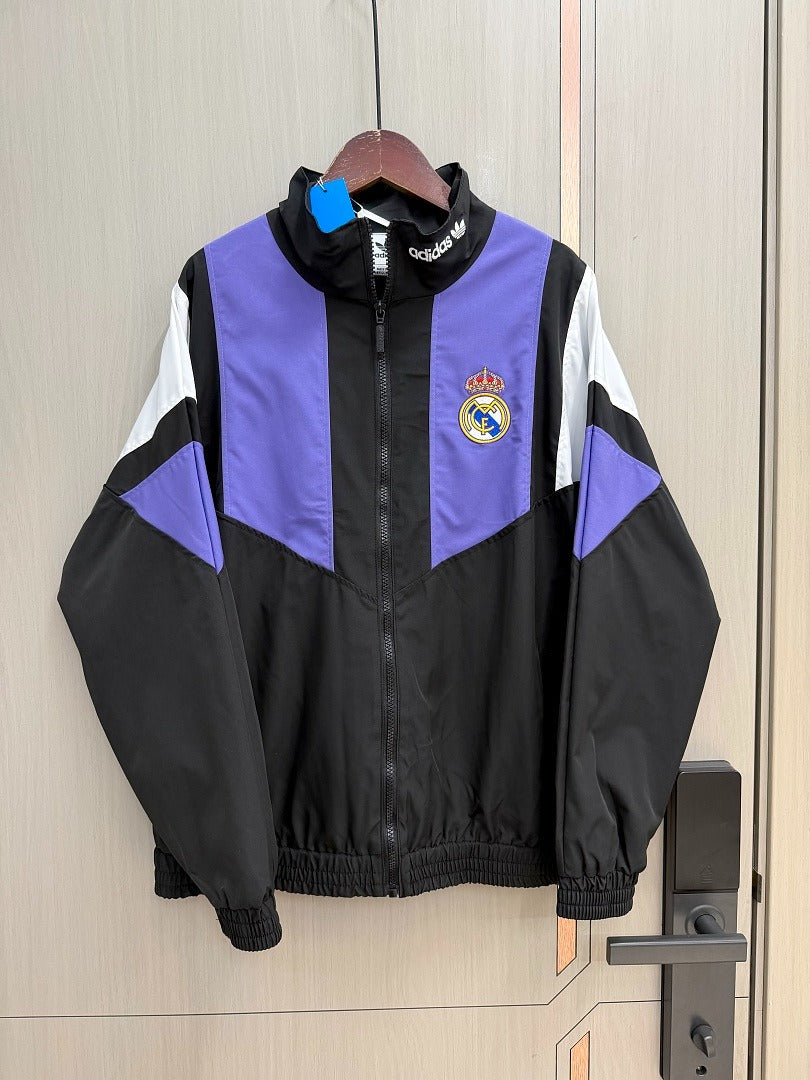 Chaqueta cortavientos Reak Madrid 26-27 negra con morado y blanco (tallas S-3XL)