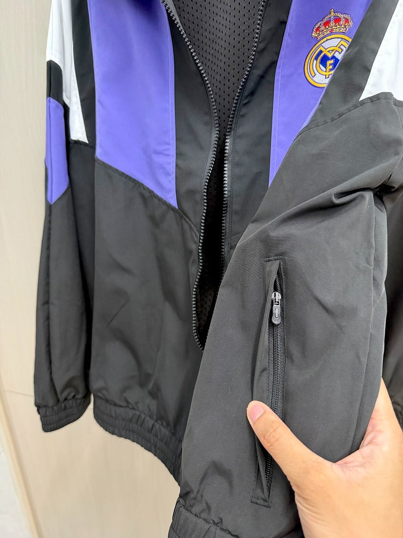 Chaqueta cortavientos Reak Madrid 26-27 negra con morado y blanco (tallas S-3XL)