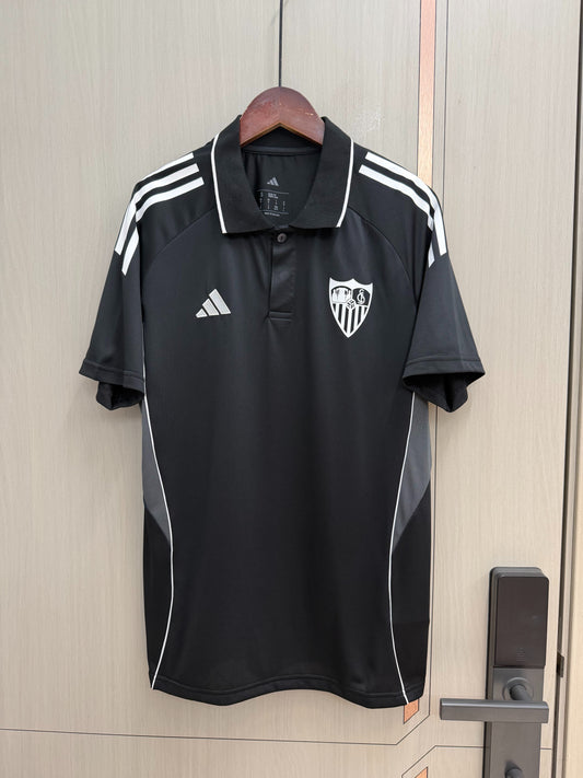 Polo Sevilla 25/26 Negro (tallas S-2XL)