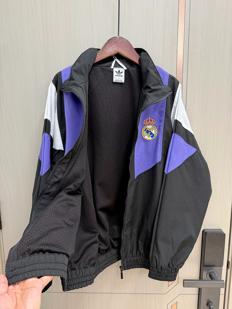 Chaqueta cortavientos Reak Madrid 26-27 negra con morado y blanco (tallas S-3XL)