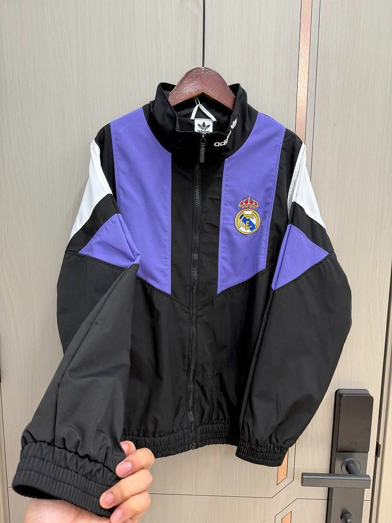 Chaqueta cortavientos Reak Madrid 26-27 negra con morado y blanco (tallas S-3XL)
