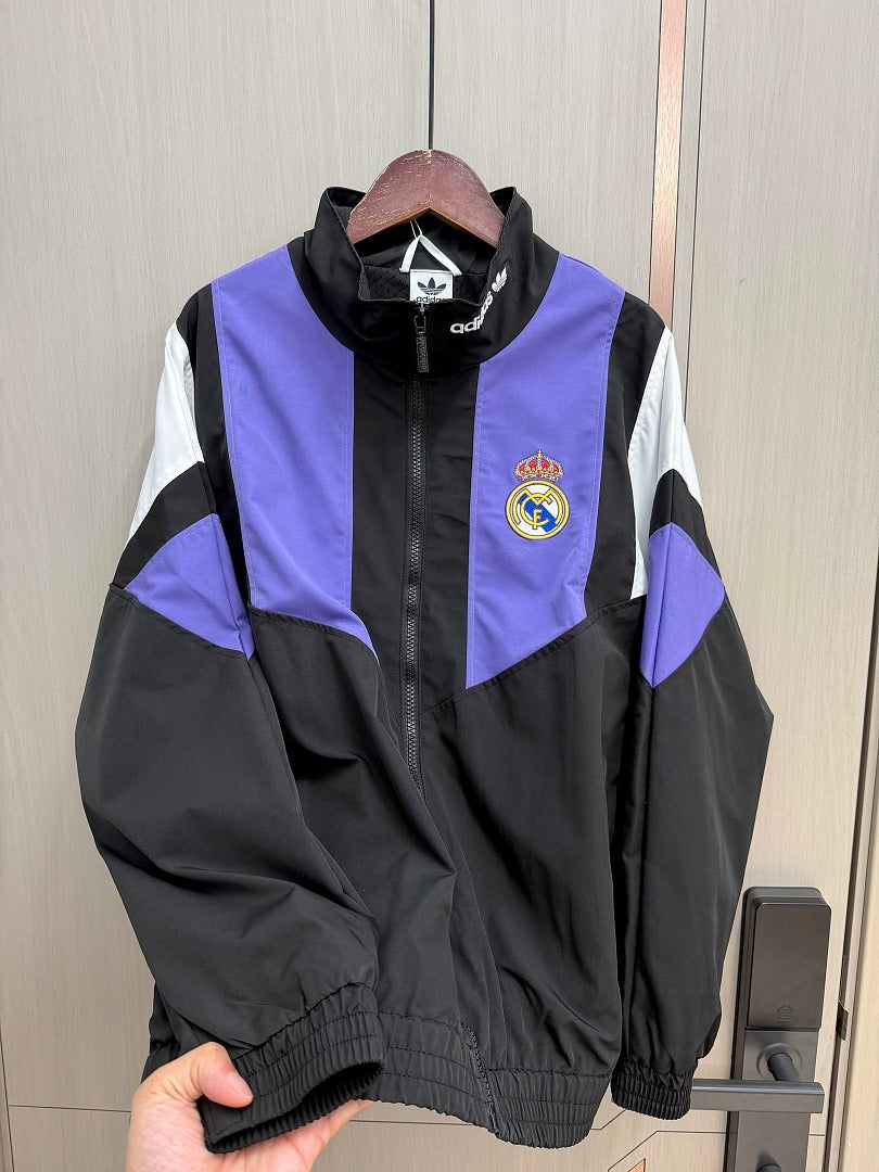 Chaqueta cortavientos Reak Madrid 26-27 negra con morado y blanco (tallas S-3XL)
